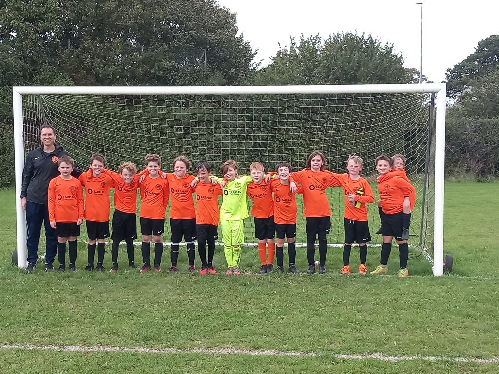 Mountsorrel Juniors U11s Lions feeling pride in new football kit thanks to Tarmac donation
