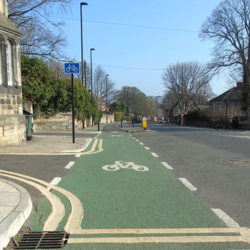 Coloured cycle lane surface to improve safety at junctions – Tarmac